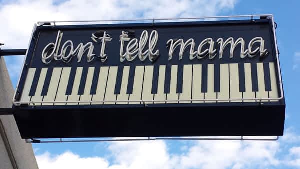 Don't Tell Mama outdoor neon sign